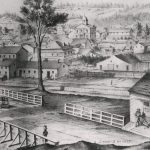 a lithograph of Dundas from the Hamilton Road. George Leavitt's house axe factory can be seen on the left behind the tree
