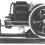 a small gasoline engine with two wheels and engine at the centre.