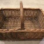 Rectangular wicker basket with handle, viewed from above